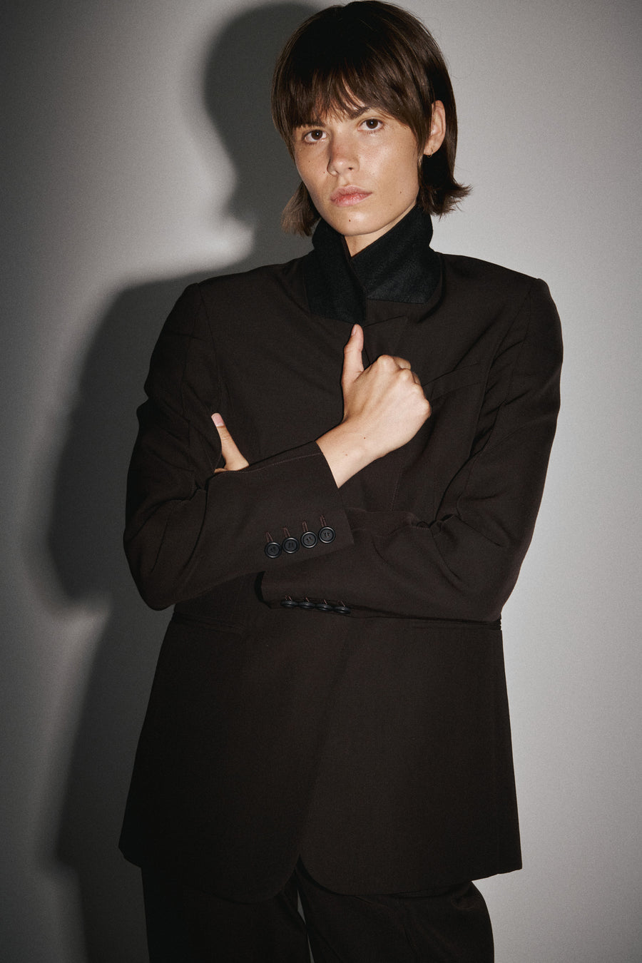 Jules wears the Maya Blazer & Emmett Pant in Bistre.