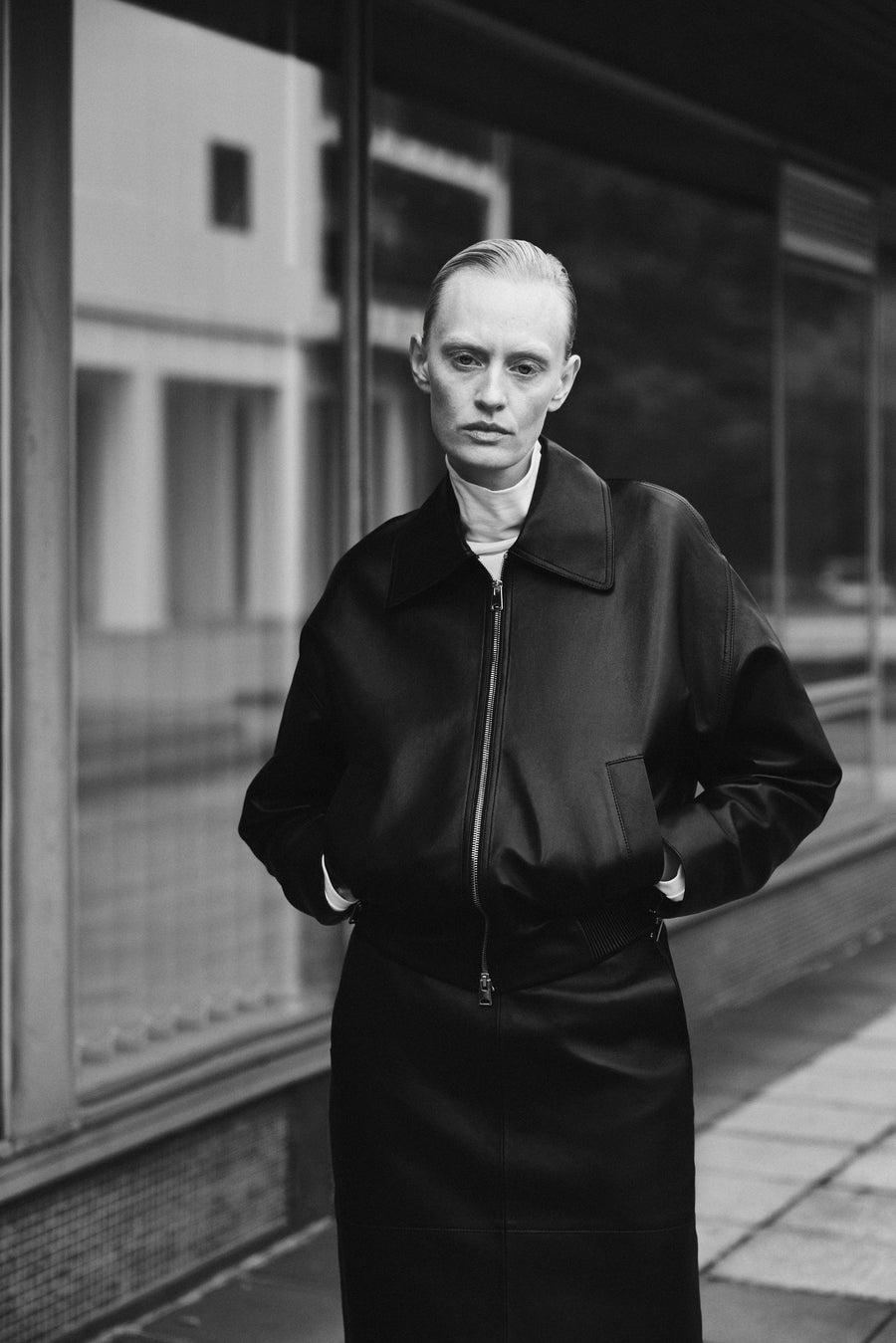 Luca wears the Vroman Leather Jacket in Black, the Miles Top in Lemon & the Wright Leather Skirt in Black