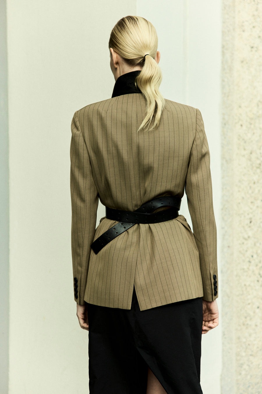 Luca wears the Maya Blazer in Bancha, Ezra Dress in Black & the Wylie Belt in Black