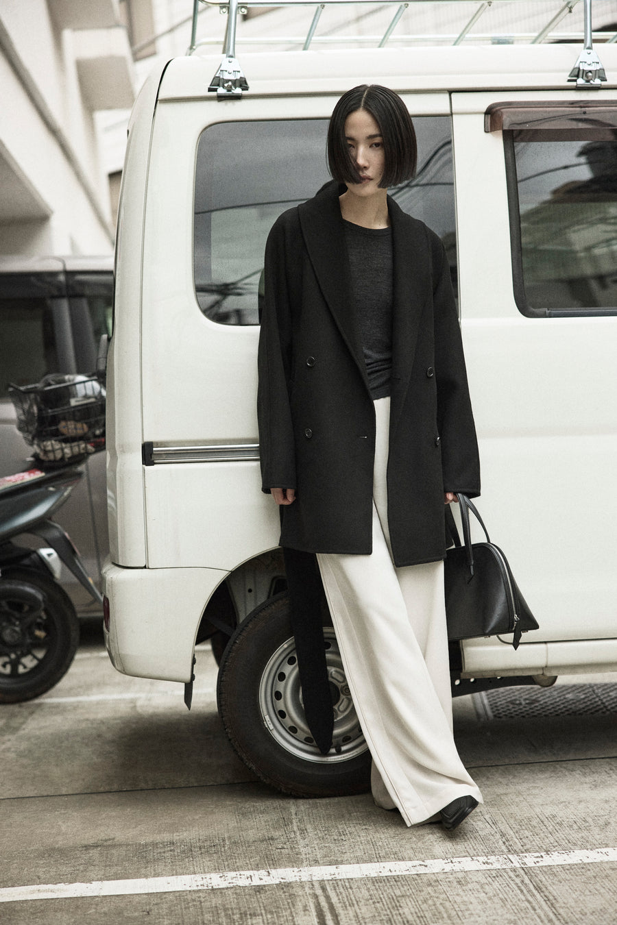 Tsugumi pairs the Crosby Jacket with the Willett Top, Angus Pant, and Harnick Top Handle Bag.