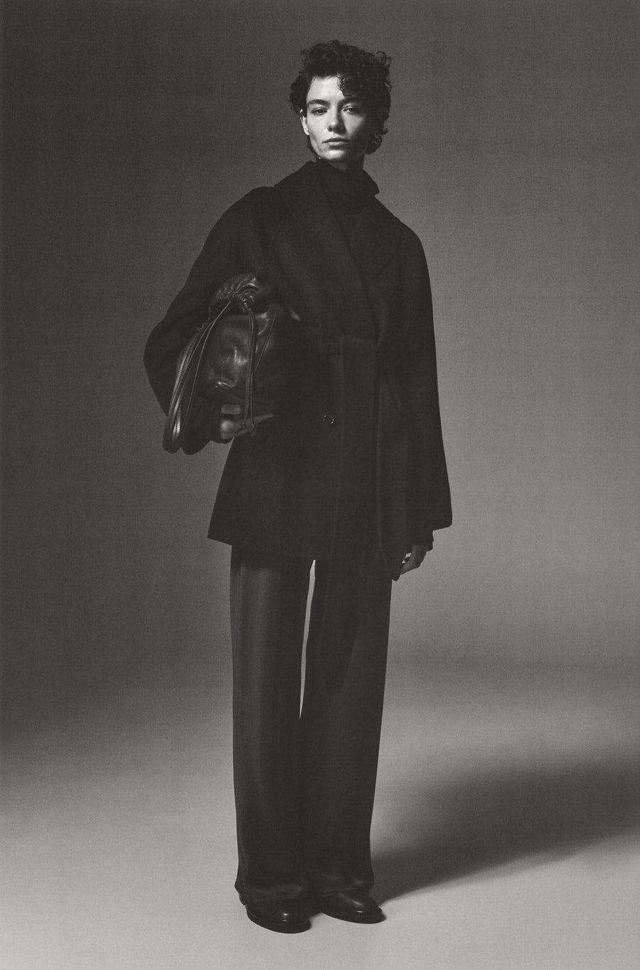 Anna Lee wears the Crosby Jacket with the Angus Pant, Sibella Bag and Easton Boot.