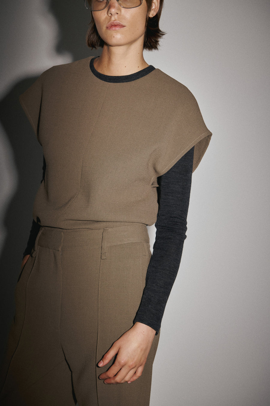 Jules wears the Aubrey Top & Jacques Pant in Sable with the Willett Top in Charcoal Melange. 