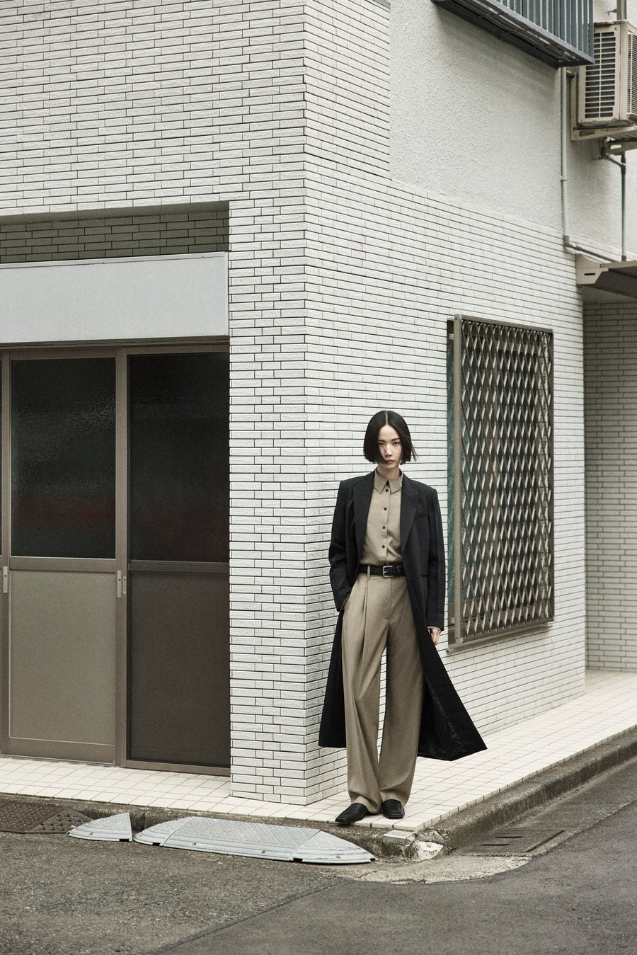 Tsugumi wears the Mylor Long Blazer over the the Philippa Shirt & Goddard Straight Pant in Pumice.