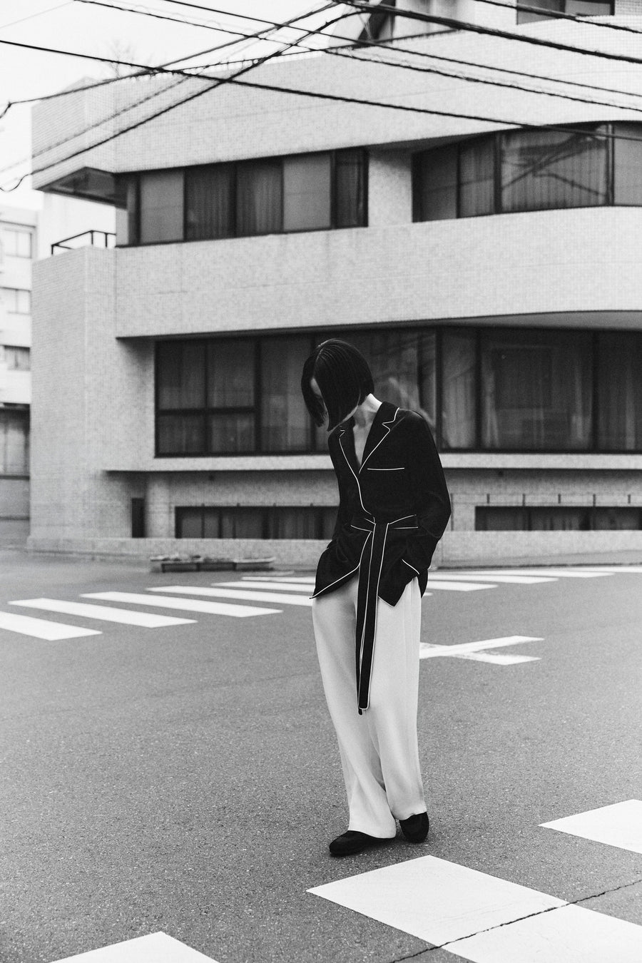 Tsugumi wears the Ivy Shirt in Black with the Angus Pant & Adams Low Sneaker.