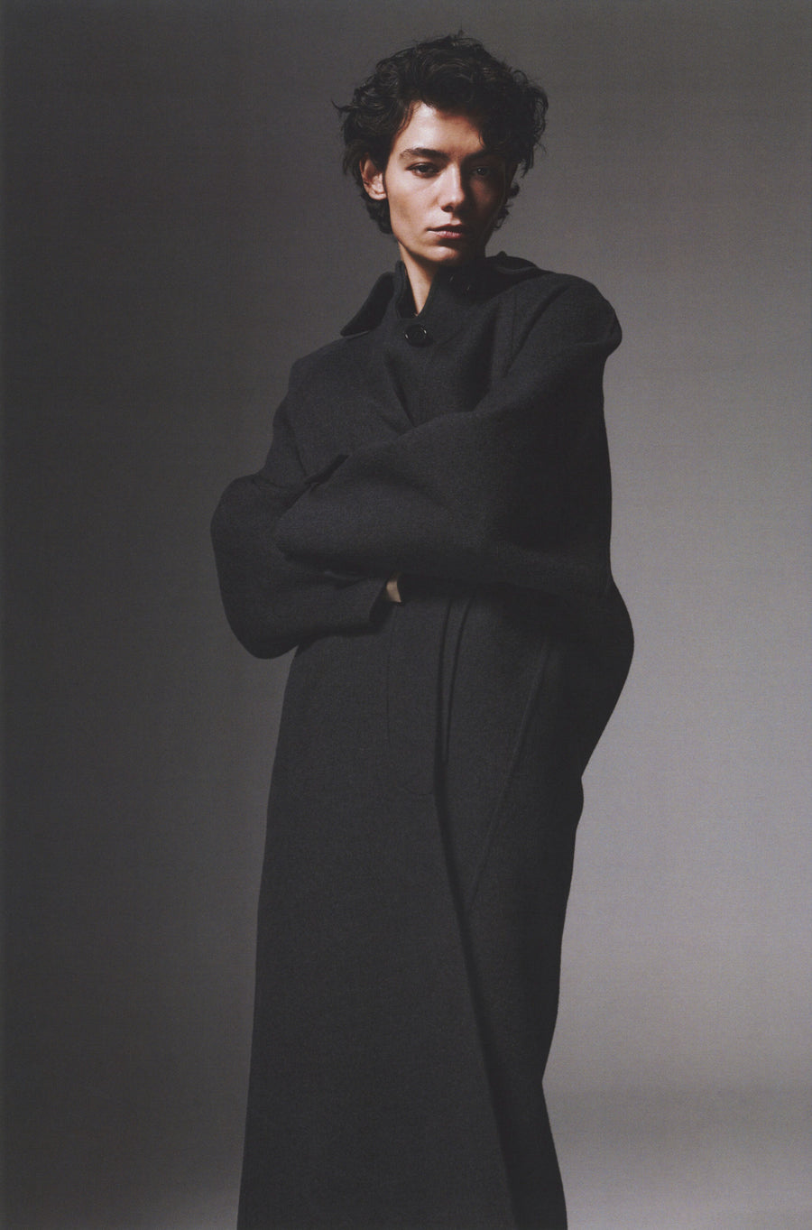 Anna Lee wears the Daniels Coat in Charcoal Melange. 