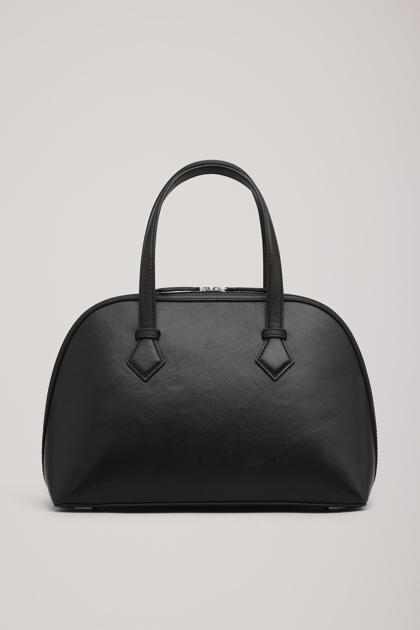 The Harnick Top Handle Bag