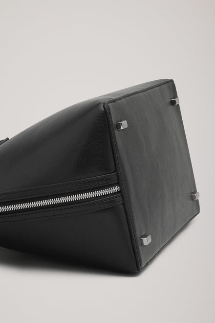 The Harnick Top Handle Bag
