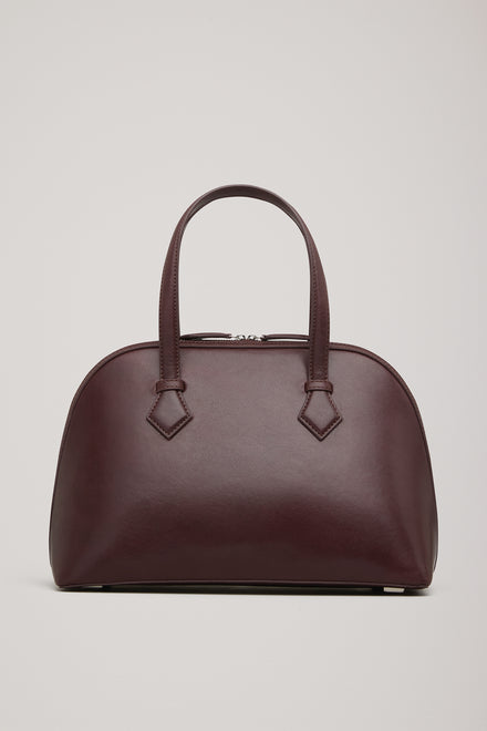 The Harnick Top Handle Bag