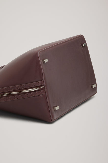The Harnick Top Handle Bag