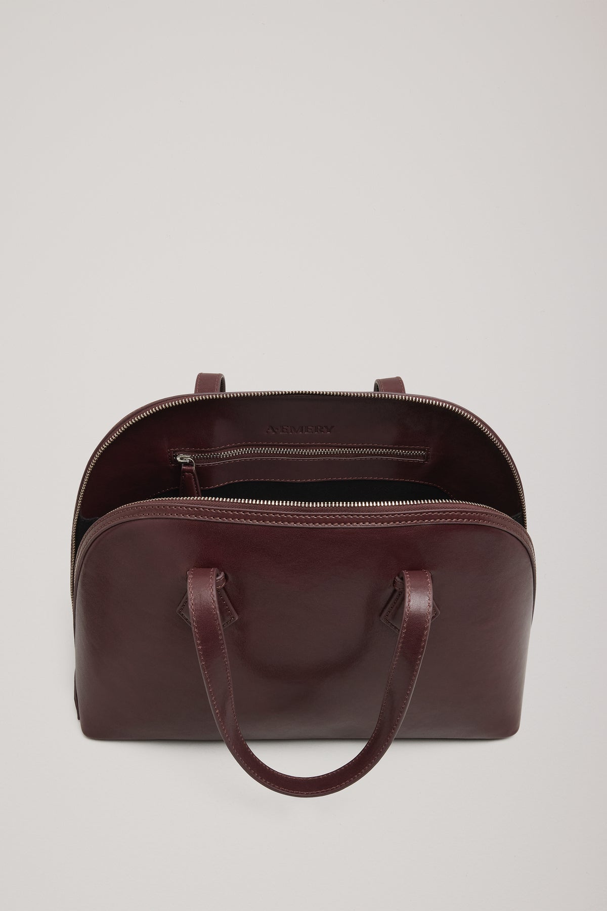 The Harnick Top Handle Bag